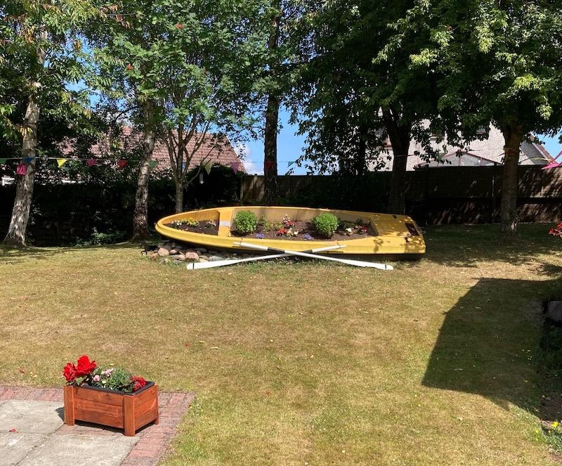 boat planter in the garden