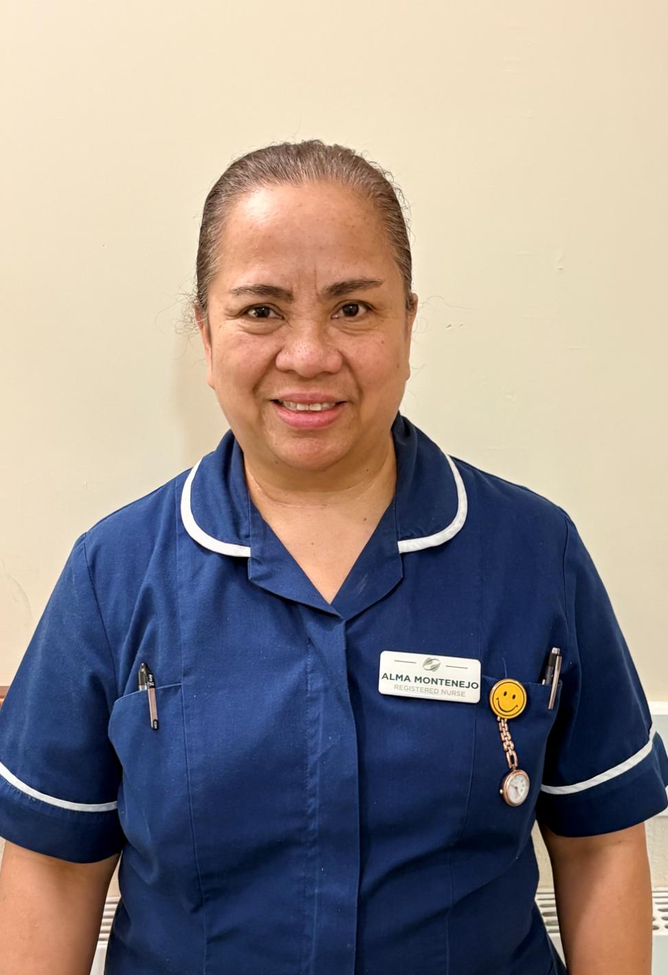 lady posing for staff photo