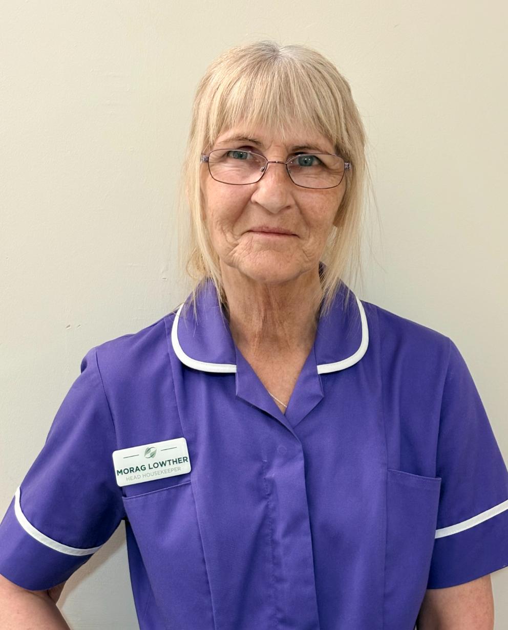 lady posing for staff photo